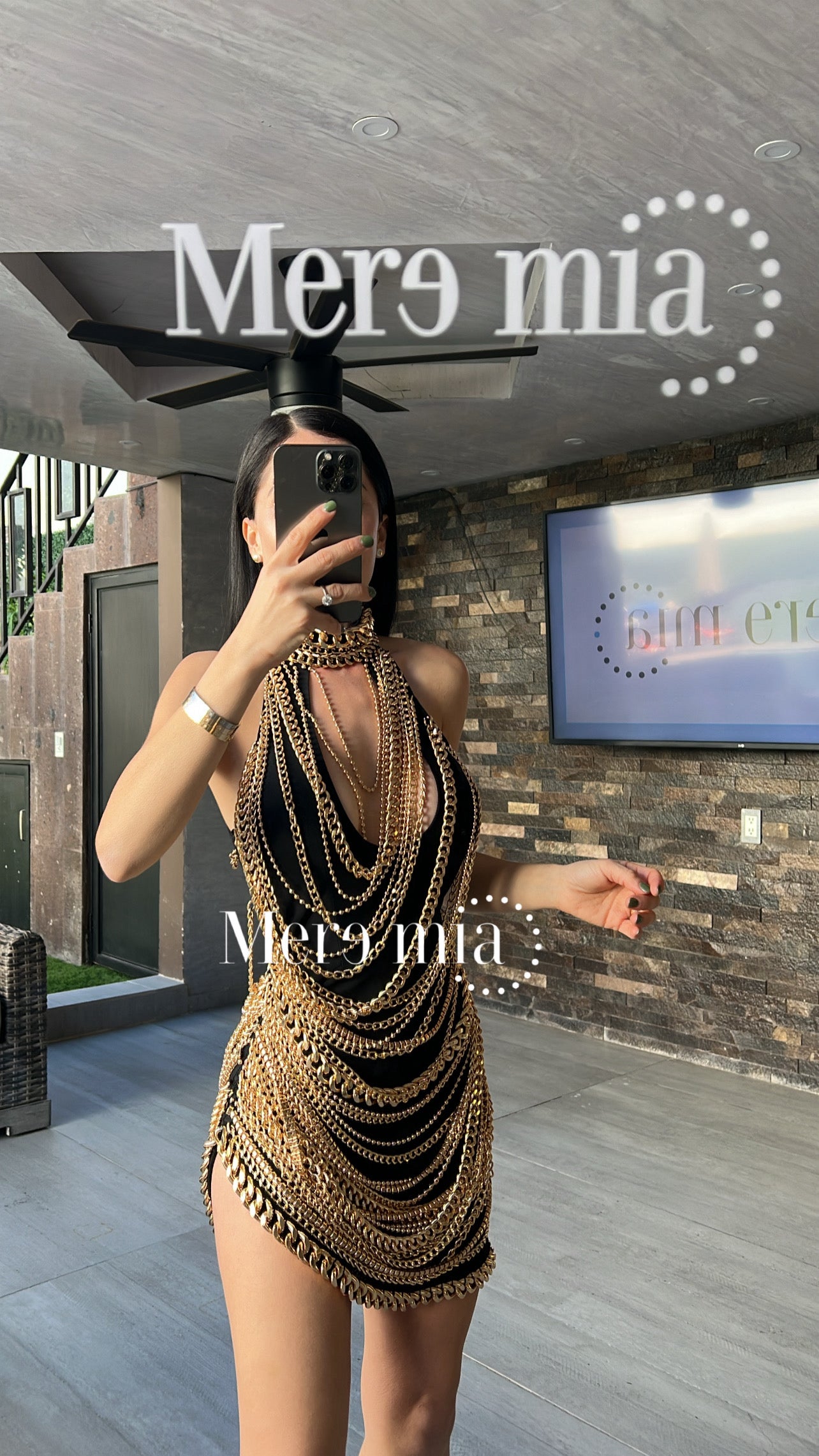 Vestido negro cadenas