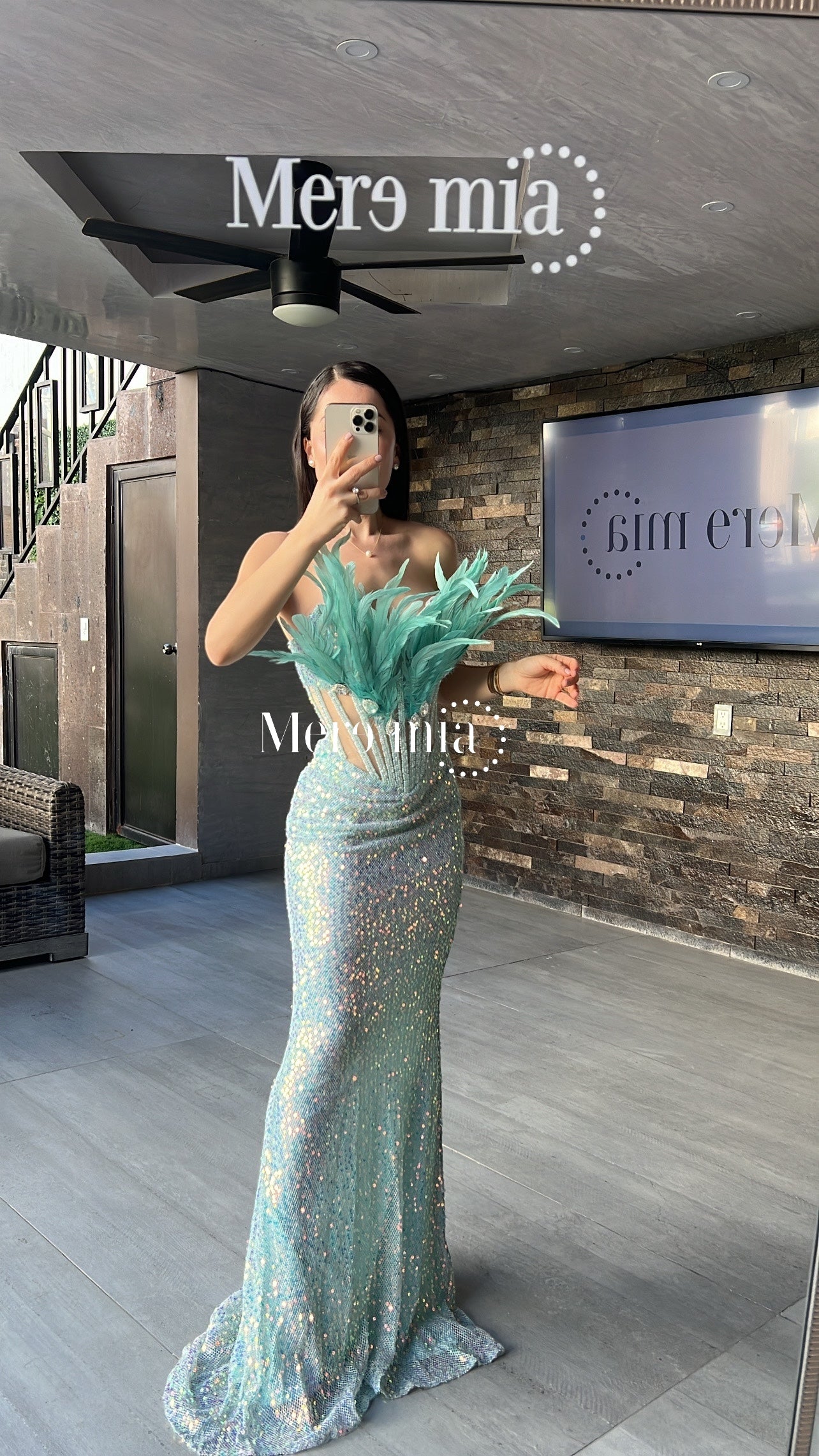 Vestido plumas aqua
