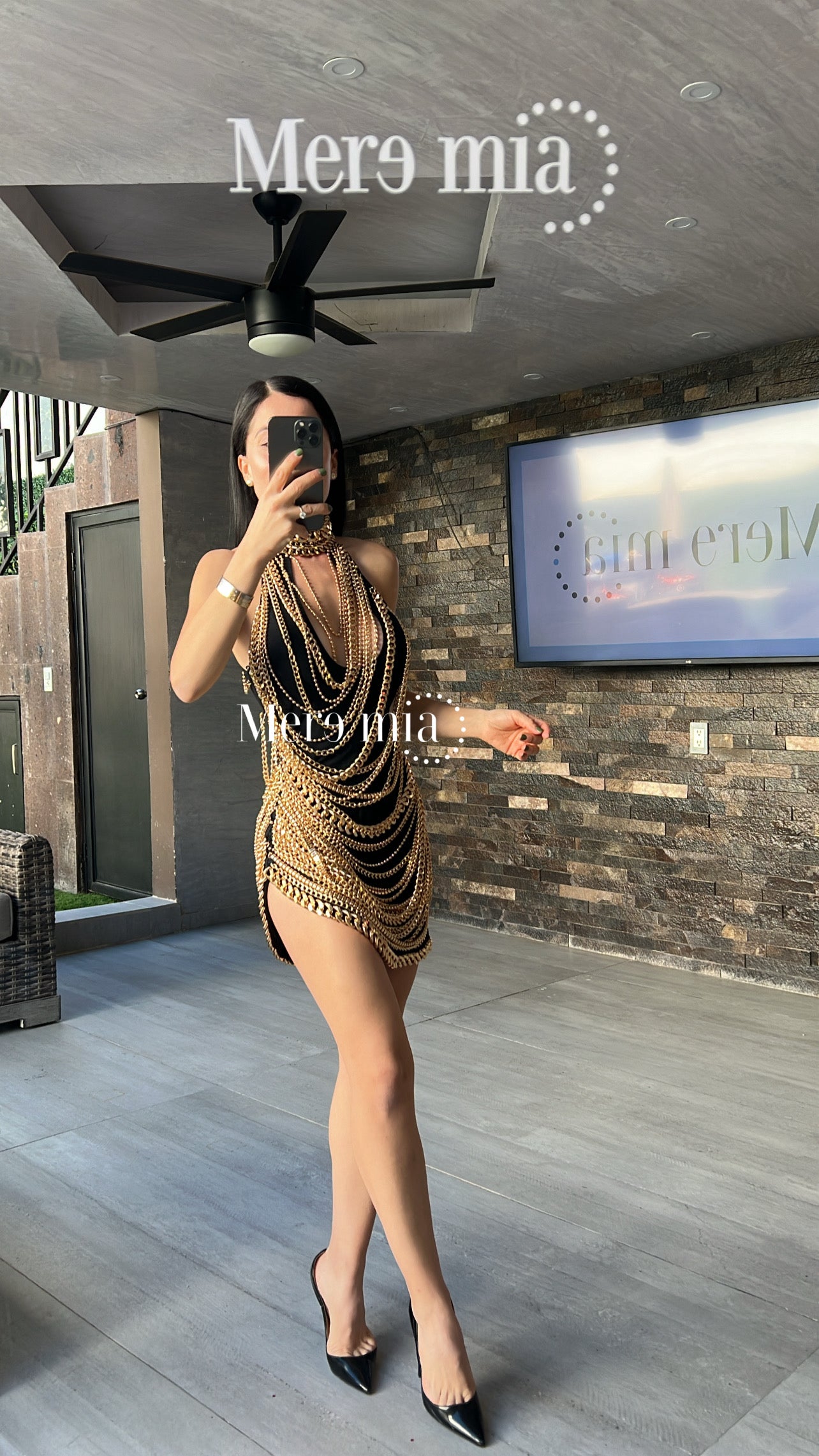 Vestido negro cadenas