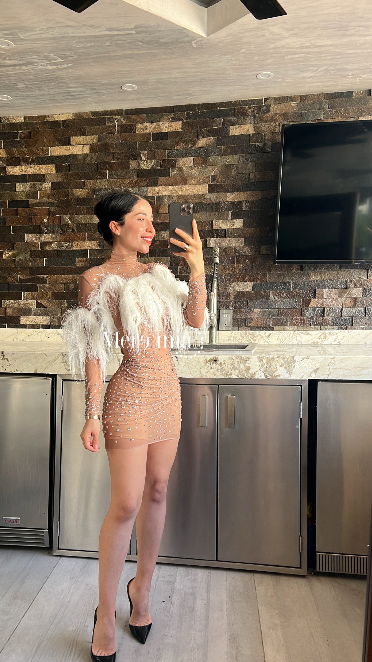 Vestido plumas corto